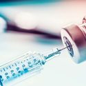 Close up of vaccine syringe