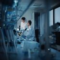 Two scientists in a research laboratory